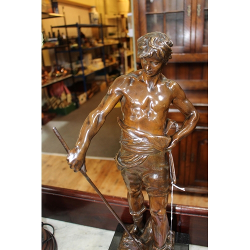 147 - Good male bronze figure entitled BELLUAIRE and signed E. Marioton, 49cm high, with plinth base. Note... 