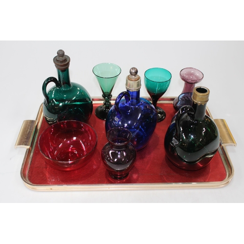 15 - Three antique blue and green glass bottle decanters, coloured glass goblets, etc.