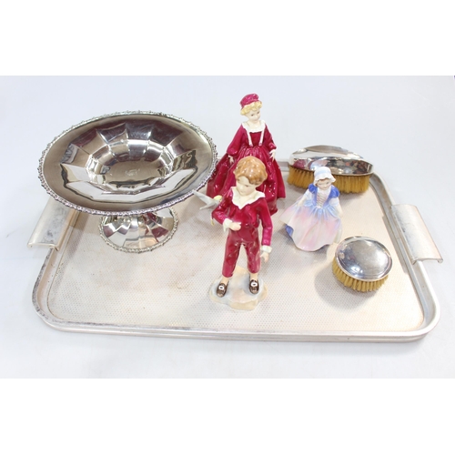 25 - Two Royal Worcester figures, Royal Doulton Dinky Do, two silver backed brushes and EP tazza (6).