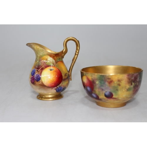 266 - Royal Worcester fruit painted cream jug and sugar basin, the basin signed E. Townsend.