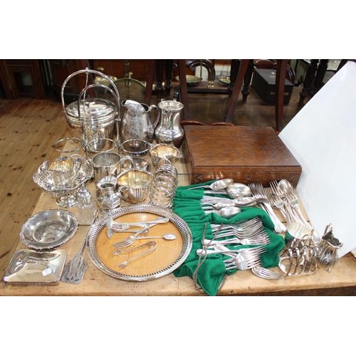 32 - EP wares including canteen. flatware, decanter stand, etc.