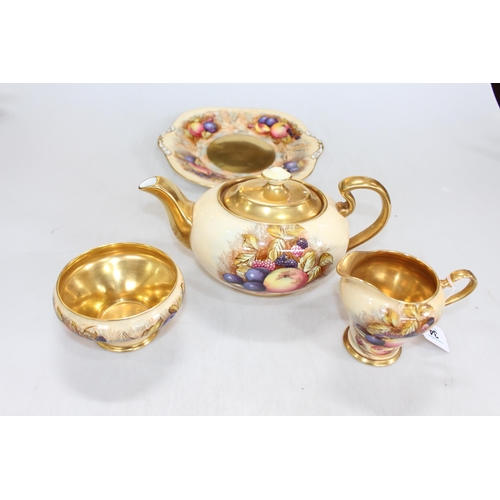 34 - Aynsley Orchard Gold tea china including teapot, small tazza and dishes, bearing D. Jones and N. Bru... 