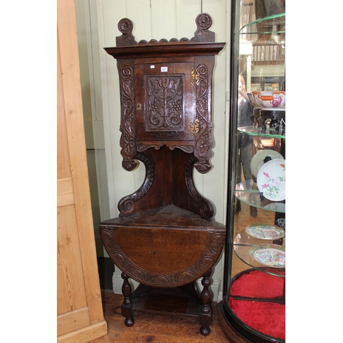 401 - Victorian carved oak corner combination cabinet-drop leaf table, 176cm.