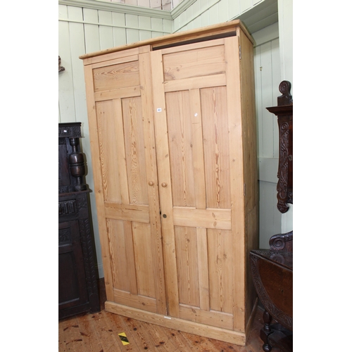 402 - George V pine double door school cupboard, 212cm by 123cm by 52cm.