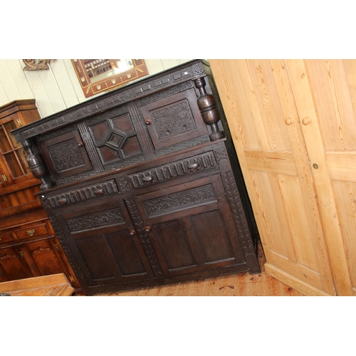 404 - Antique carved oak court cupboard, 101.5cm by 164.5cm by 57cm.