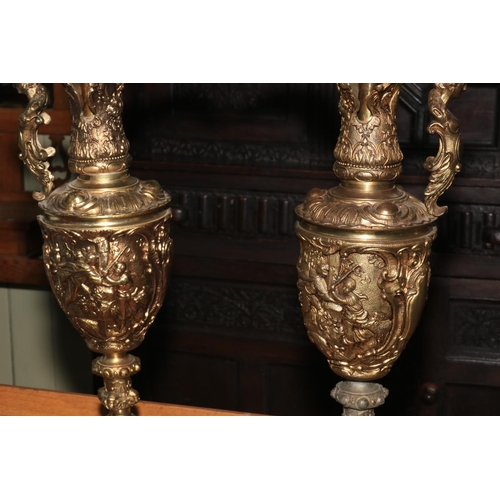 152 - Pair large ornate gilt metal ewers, suitable for table lamps, 68cm.