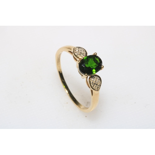 207 - 9 carat gold green stone and diamond ring, size T.