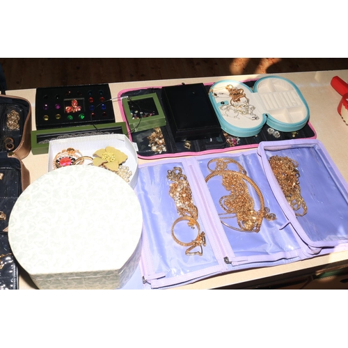 23 - Large collection of costume jewellery, pearls and watches.