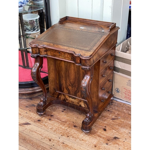 397 - Victorian burr walnut four drawer Davenport having shaped front raised on scrolled supports, 79cm by... 