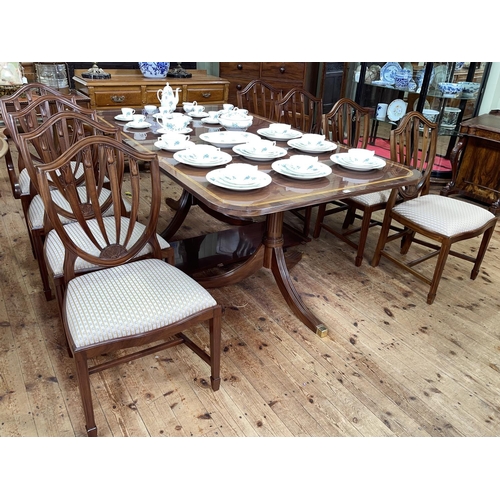 414 - Mahogany and satinwood banded twin pedestal extending dining table and leaf 76cm by 201cm by 116cm (... 