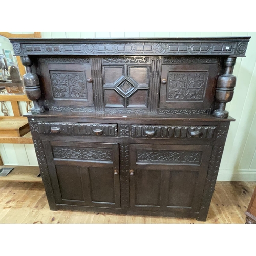 424 - Antique carved oak court cupboard, 101.5cm by 164.5cm by 57cm.