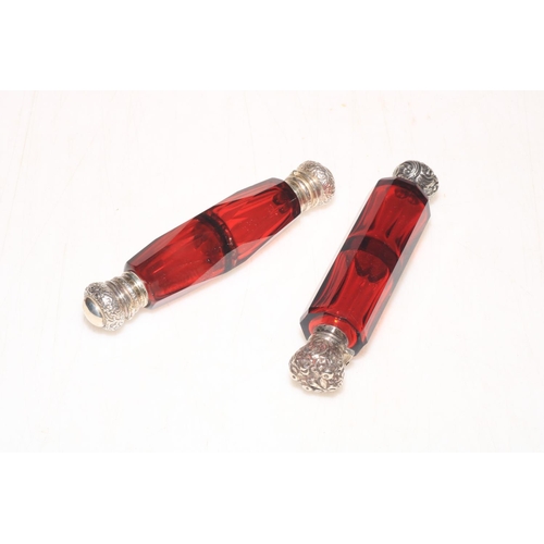 247 - Two late Victorian cranberry glass double scent bottles.