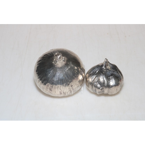 249 - Two John silver onion paperweights.