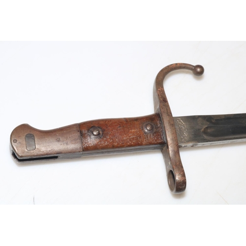 282 - Middle Eastern bayonet with scabbard, blade 46cm length.