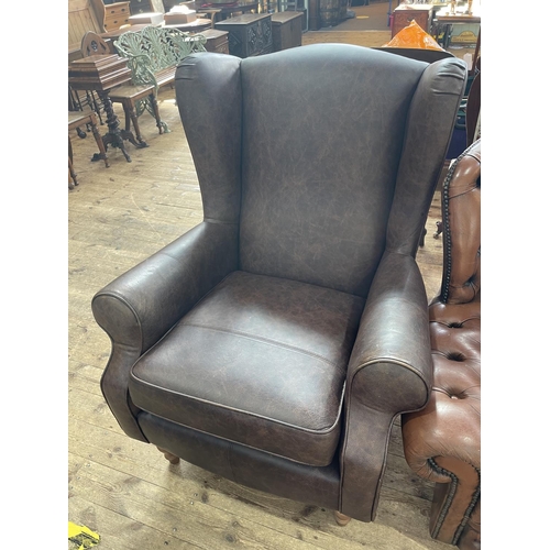 408 - HSL brown leather? wing back armchair.