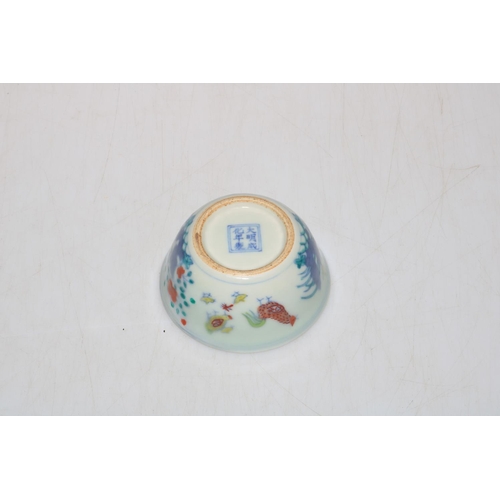 169 - Chinese polychrome chicken decorated tea bowl, 8.5cm diameter.