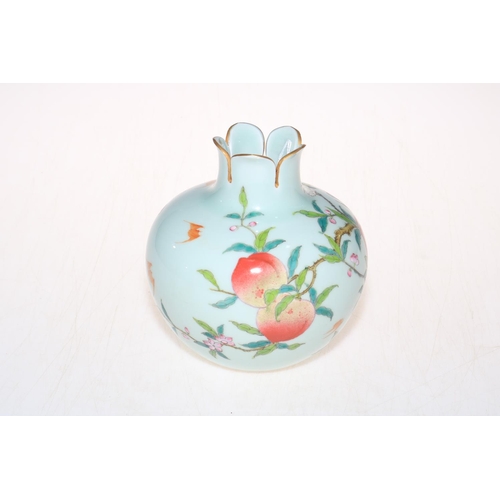 173 - Chinese peach vase with shaped neck, 15cm.