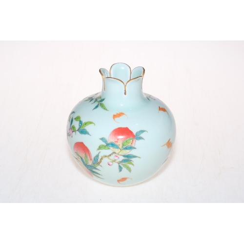 173 - Chinese peach vase with shaped neck, 15cm.