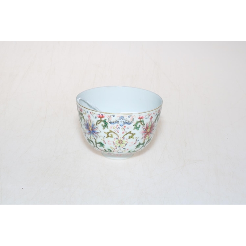 179 - Chinese famille rose tea bowl with formal decoration, six character mark, 9.5cm diameter.