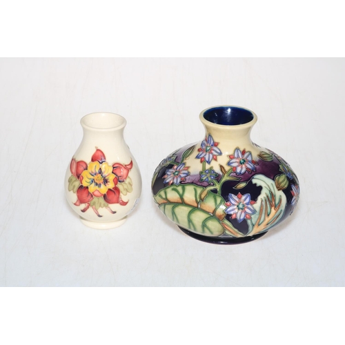 300 - Two small Moorcroft Pottery vases, 10.5cm.