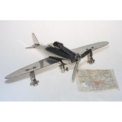 306 - Metal model of WWII fighter plane, 45cm across and map (2).