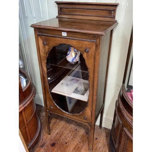 416 - Edwardian mahogany glazed panel door music cabinet, 122cm by 53cm by 35cm.