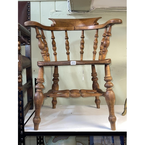 418 - Elm seated Captains chair on turned legs.