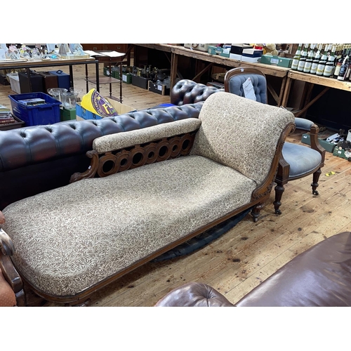 438 - Victorian walnut scroll end chaise longue and Victorian mahogany framed library chair.