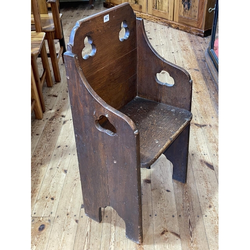 447 - Victorian oak Gothic style church chair, 88cm by 45cm by 32cm.