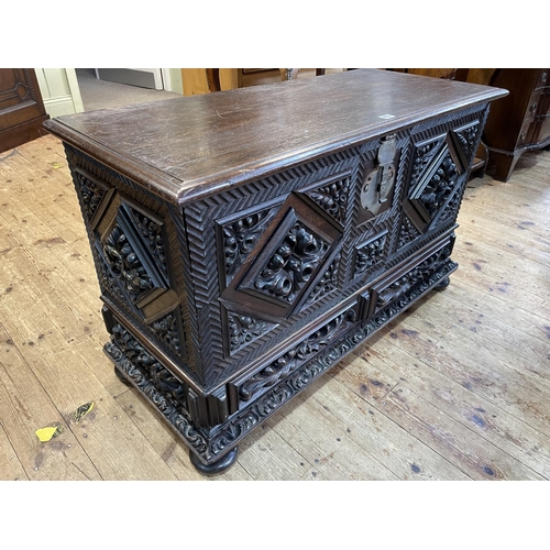 472 - Carved oak two drawer coffer, 66cm by 106cm by 45cm.