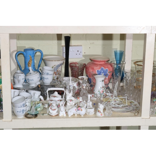 89 - Full shelf of glass, china, teaware, animal ornaments, family bible, pictures, wall clock, etc.