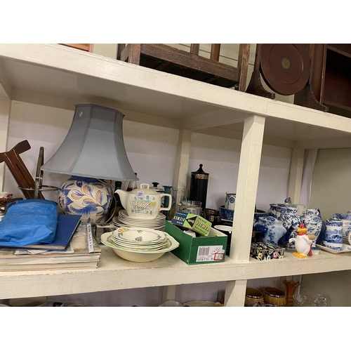 102 - Blue and white pottery, Portmeirion pottery, linens, table lamp, games, etc.