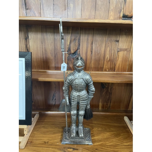 142 - Cast metal knight companion set, 74cm high.