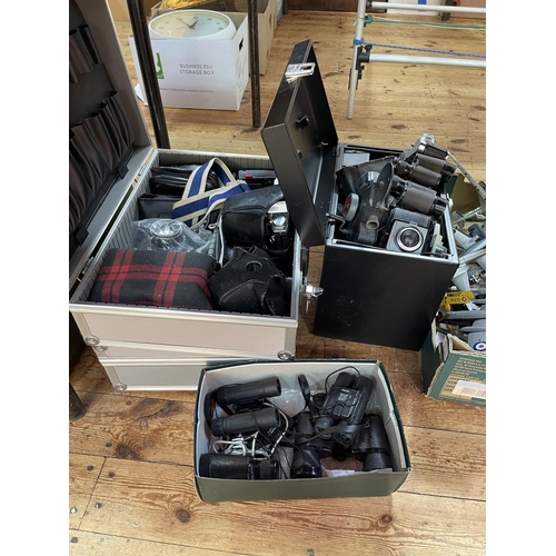 23 - Collection of cameras and binoculars.