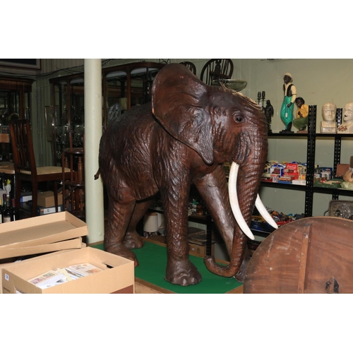 139 - Large Liberty style leather elephant, approximately 115cm high.