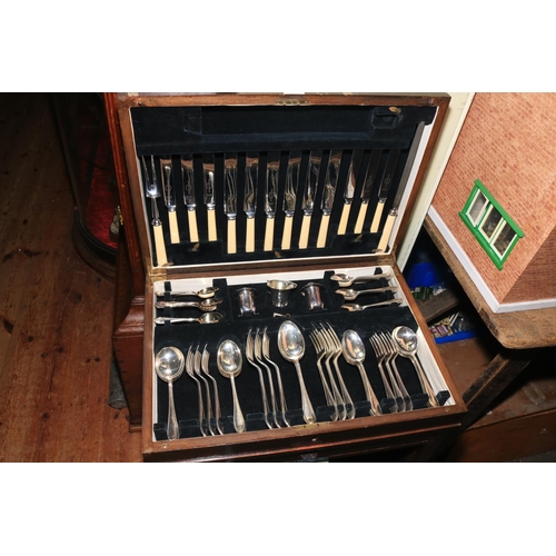 143 - Sheffield silver plate canteen of cutlery, 76cm high.