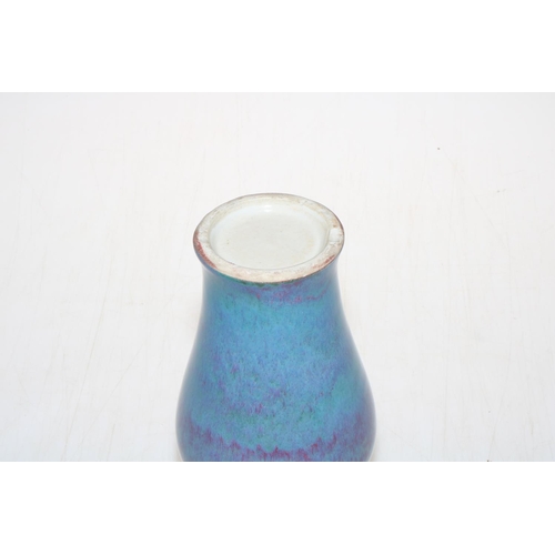 163 - Chinese baluster vase in blue/mauve streak glaze, 19cm.