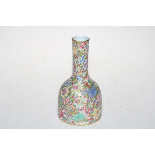 165 - Chinese famille rose bottle vase, with six character mark, 18cm.