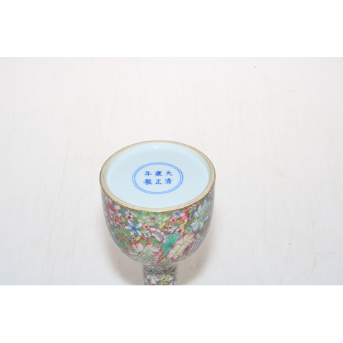 165 - Chinese famille rose bottle vase, with six character mark, 18cm.