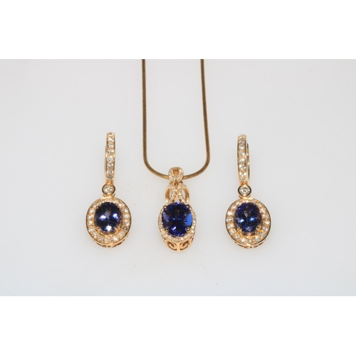 188 - 14k gold diamond and tanzanite pendant on chain, tanzanite 3.69 carats, and pair of 14k tanzanite an... 