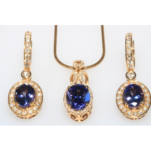 188 - 14k gold diamond and tanzanite pendant on chain, tanzanite 3.69 carats, and pair of 14k tanzanite an... 