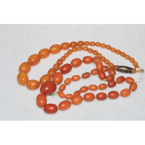 204 - Two untested amber bead necklaces.