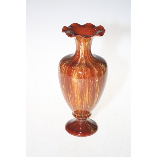 215 - Linthorpe Pottery vase in brown streak glaze, shape number 2010, 23cm.