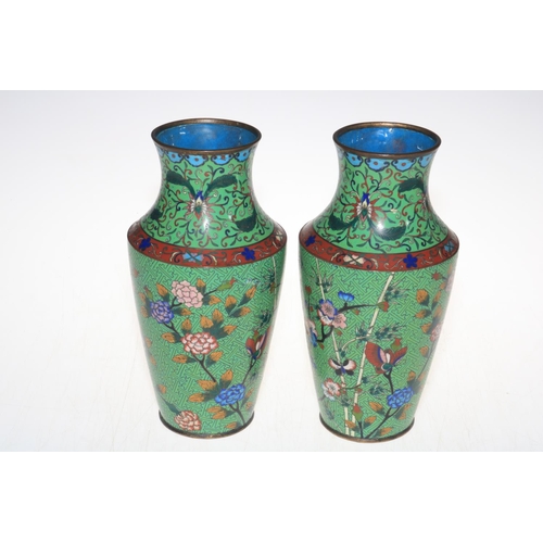 216 - Pair Cloisonné vases with butterflies and flowers, 24.5cm.