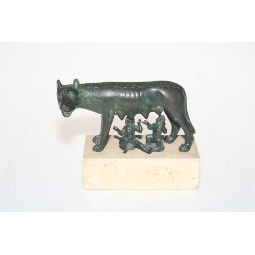 217 - Antique bronze of Romulus and Remus on granite base, 15cm across.