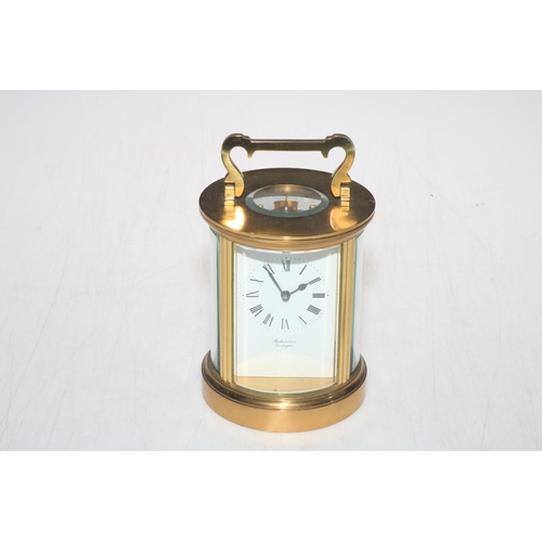 221 - Gilt brass cylindrical carriage clock, movement ACG, retailed by Richardson, Darlington, 15cm includ... 