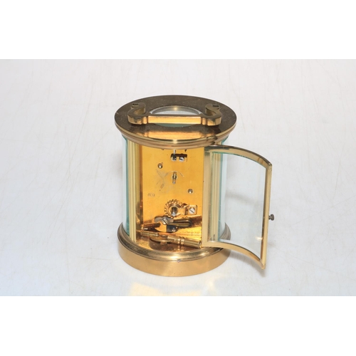 221 - Gilt brass cylindrical carriage clock, movement ACG, retailed by Richardson, Darlington, 15cm includ... 