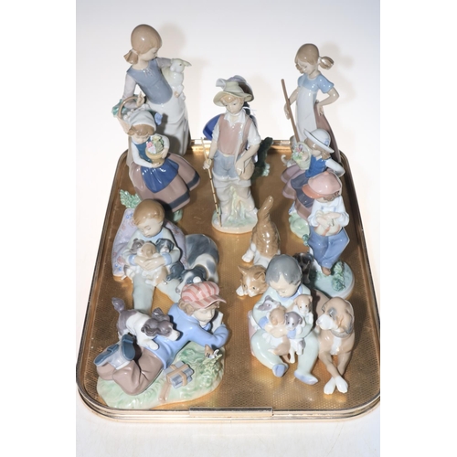 23 - Eleven Lladro figures and groups.