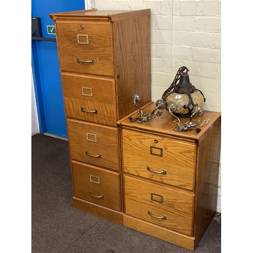 322 - Pair matching oak finish four drawer and two drawer filing cabinets.