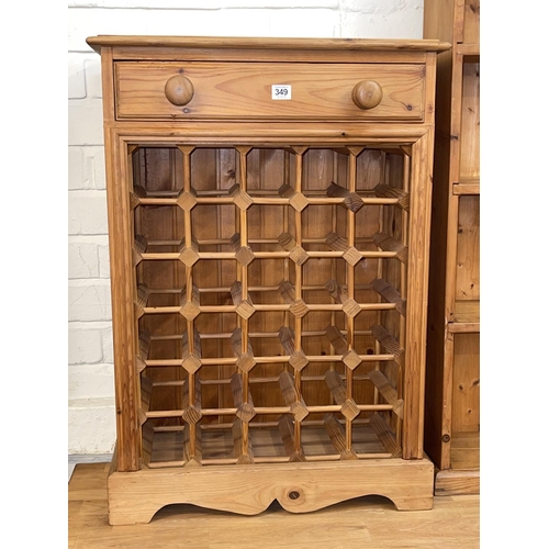 349 - Pine thirty bottle wine cabinet, 83cm by 58.5cm by 26cm.